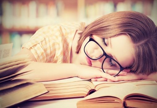 sleeping on books